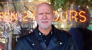 Photo of Stuart Terry wearing a black leather jacket